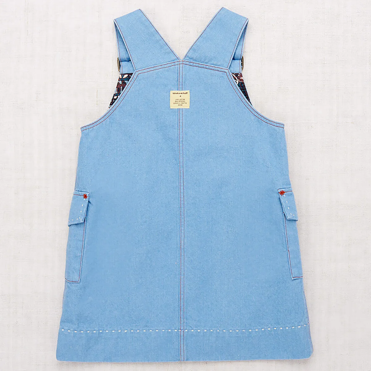 Buckle Jumper Dress in Baby Blue by Misha & Puff