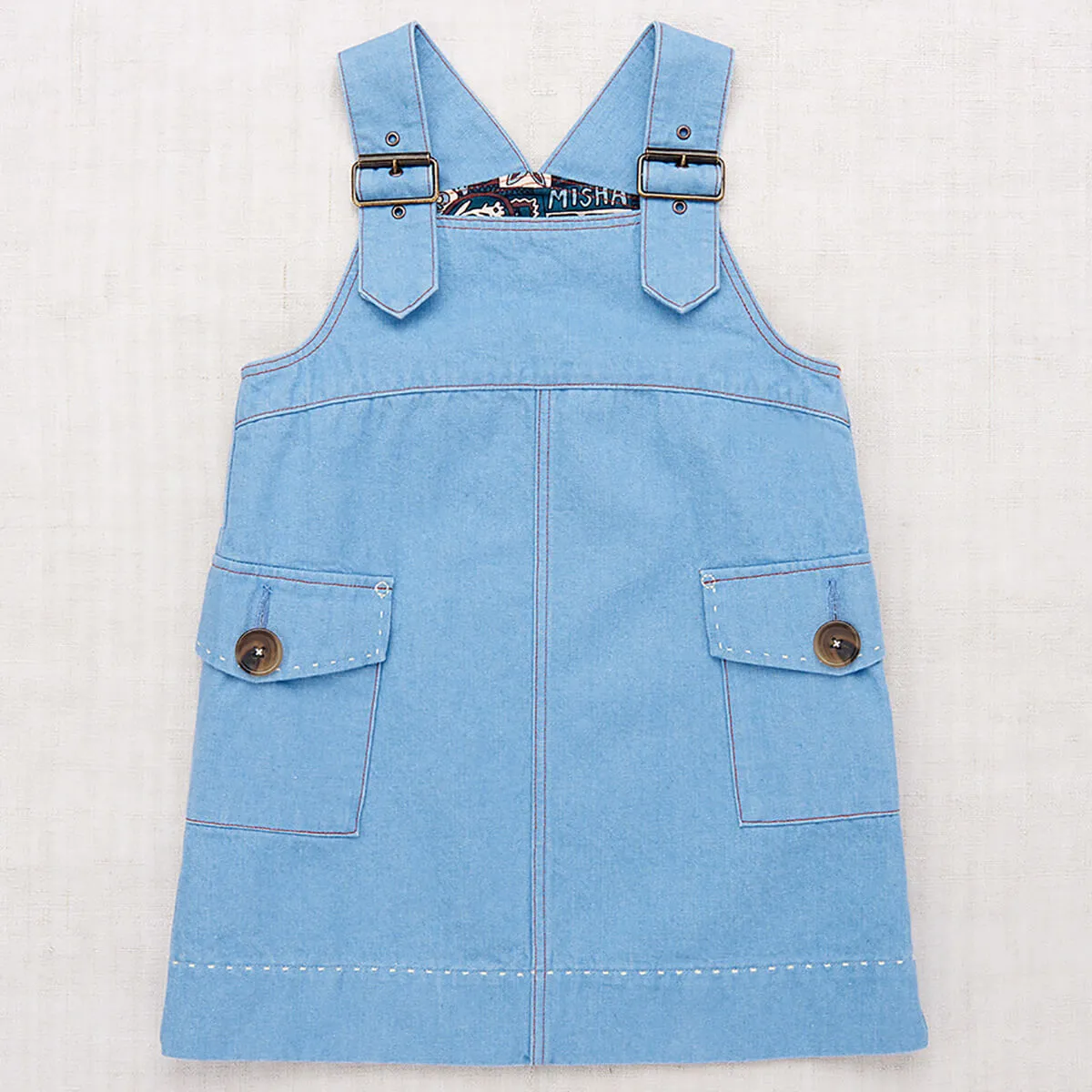 Buckle Jumper Dress in Baby Blue by Misha & Puff