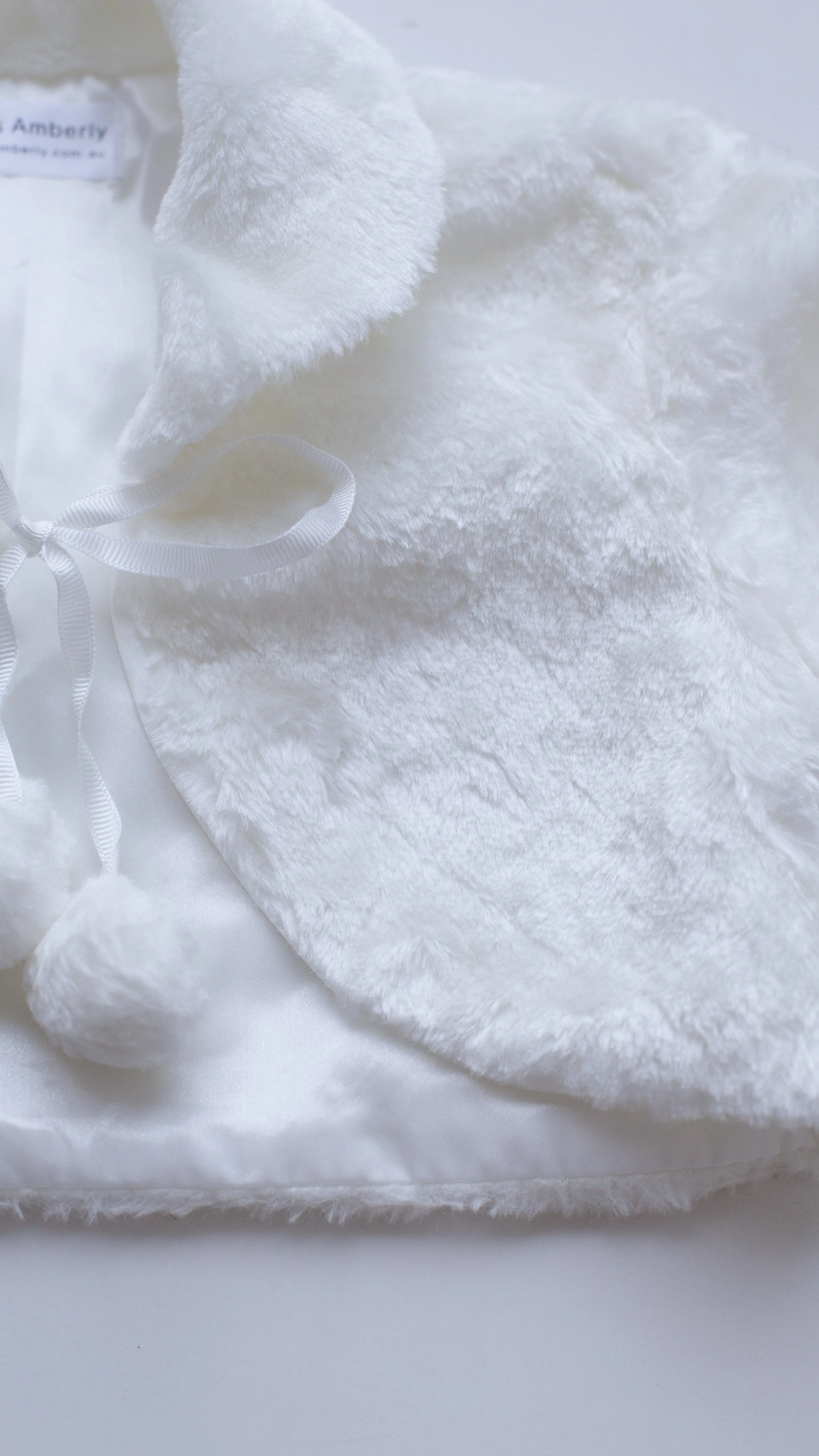sleeved fur cape